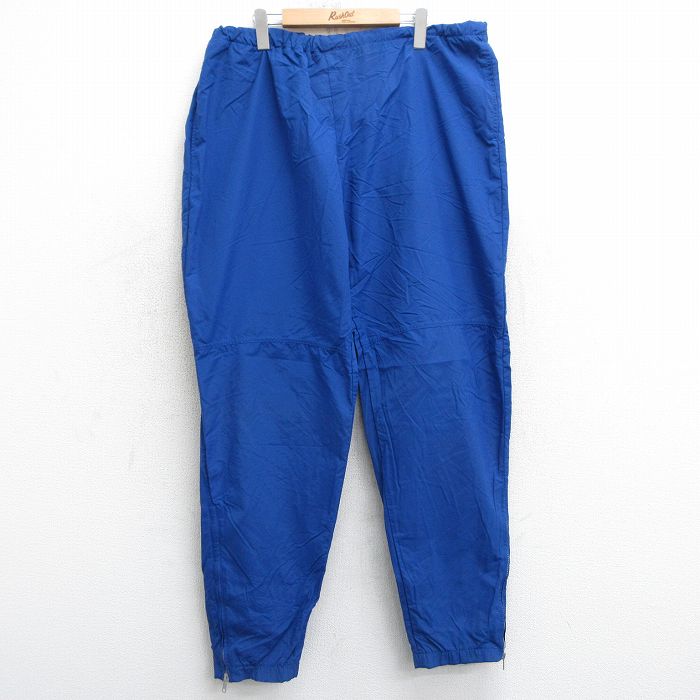 【商品番号】 pasw25022980 【商品名】 W38 & starf;古着 ナイロン パンツ メンズ 90年代 90s 無地 USA製 青 【表記サイズ】 XL 【実寸サイズ】 ウエスト